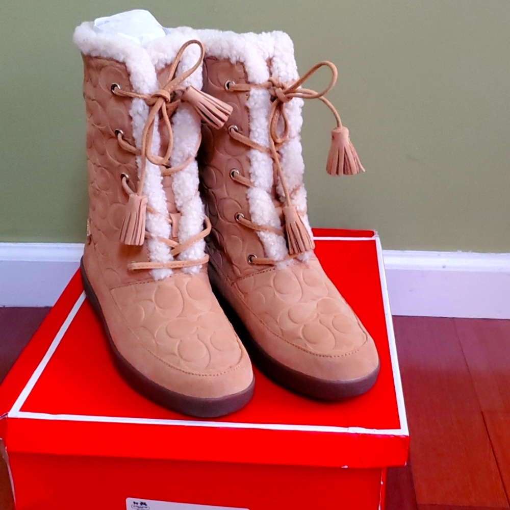 Tan coach lace up boots